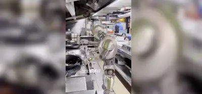 Çin'de bir mutfakta çalışan robotun ortalığı dağıttığı video gerçek mi?