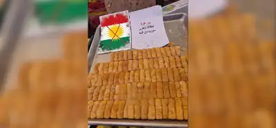 Görsel Suriye’deki gelişmelerin ardından Gazze'de dağıtılan baklavayı mı gösteriyor?