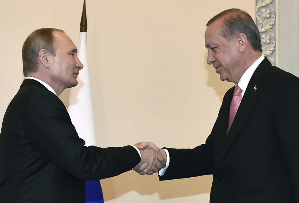 Erdoğan ve Putin'in tokalaşırken çekilen fotoğrafı
